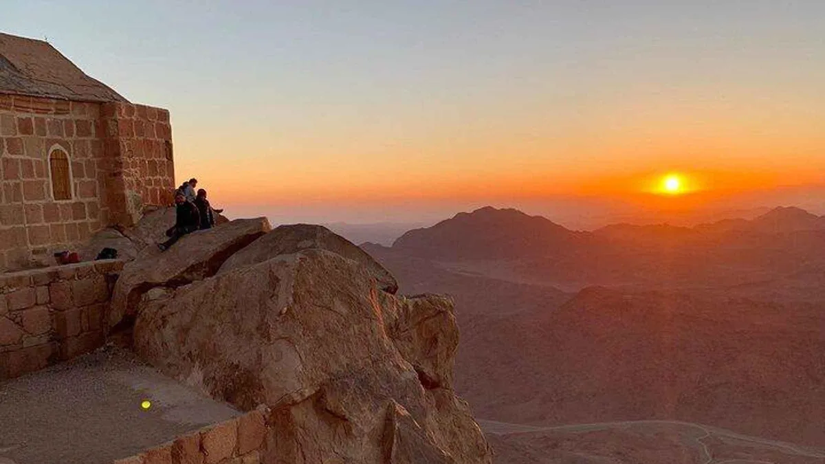 Sunrise over the granite peaks of South Sinai from Mount Sinai on a Spanish-guided St Catherine's Monastery tour, Egypt